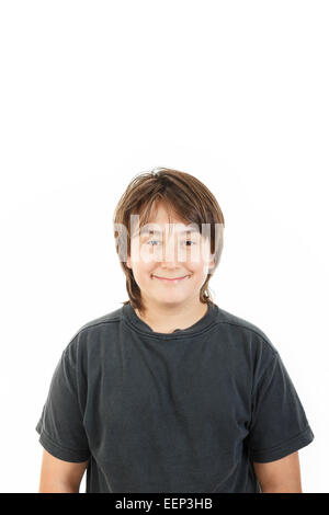 cute young male chubby kid or boy smiling and posing in black dark t-shirt on white background Stock Photo