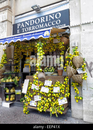 Heavily decorated shop in Naples, Italy, displaying lemons Stock Photo