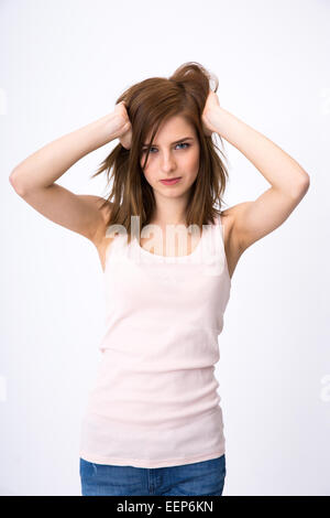 Portrait of attractive woman posing over gray background Stock Photo