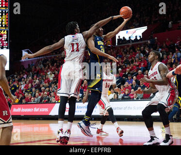 Piscataway, New Jersey, USA. 20th Jan, 2015. Michigan's guard/forward Aubrey Dawkins (24) shoots a basket around Rutgers' forward Kadeem Jack (11) in the second half during Big 10 Conference basketball action between the Rutgers Scarlet Knights and the Michigan Wolverines at the Louis Brown Athletic Center (The RAC) in Piscataway, New Jersey. Michigan defeated Rutgers 54-50. Credit:  csm/Alamy Live News Stock Photo