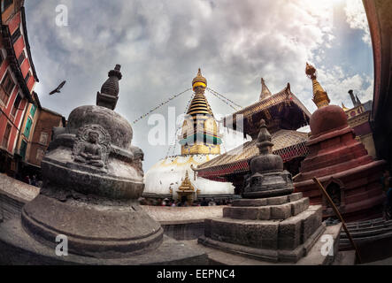 Swayambhunath stupa complex at overcast cloudy sky in Kathmandu, Nepal Stock Photo