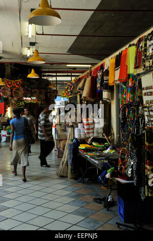 Durban, KwaZulu-Natal, South Africa, shoppers walking past colourful shop display, Victoria Market complex, city, people, shopping Stock Photo