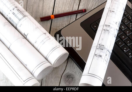 Architecture rolls architectural plans project architect blueprints Stock Photo