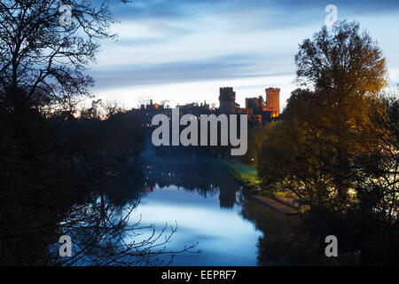 Warwick Castle, floodlit at dusk. Warwickshire. UK. Stock Photo