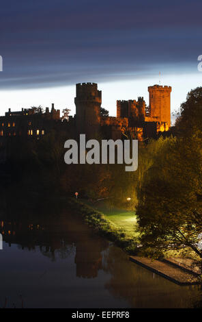 Warwick Castle, floodlit at dusk. Warwickshire. UK. Stock Photo