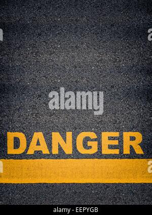 Danger As Yellow Asphalt Road Markings Stock Photo