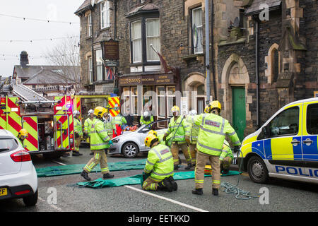 Bowness on Windermere Cumbria UK 21st January 2015. Car crashed into shop .Elderly woman has to be cut out of car -then flown by air ambulance to hospital Credit:  Gordon Shoosmith/Alamy Live News Stock Photo