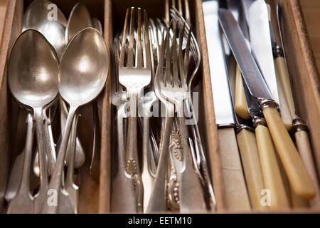 Silver Cutlery Arranged In Drawer Stock Photo