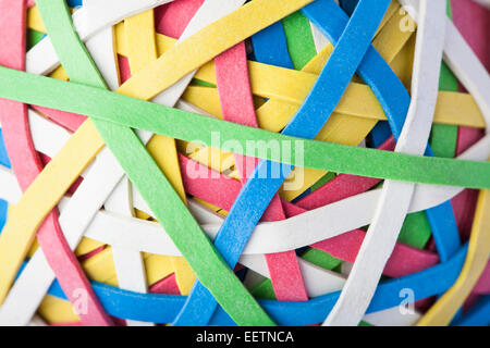 A frame of multi-colored colorful rubber bands for hair, combs and hair  clips on a black background.Copy space Stock Photo - Alamy