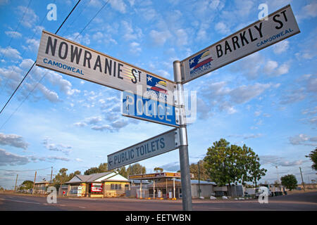 Signpost along the Barkly Highway at Camooweal, small village in north-western Queensland, Australia Stock Photo