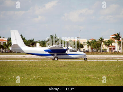 Side view of turboprop airplane on the ground taciing Stock Photo - Alamy