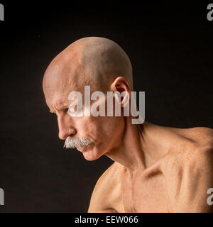 Old Bald Man in Profile Stock Photo