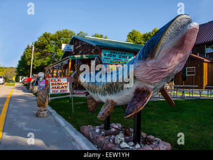 A large muskie statue stands in front of the Valley Fish and Cheese Shop in Prairie du Chien, Wisconsin  on the Mississippi Rive Stock Photo