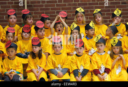 Orange CT USA--Kindergartners at Mary L. Tracy School in Orange wait to graduate during the 'D.A.R.E. To Be Safe' Assembly at the school after completing the lessons with Orange Police. Stock Photo