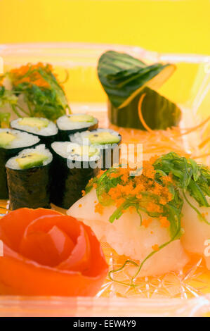 Avocado sushi and whitefish nigiri on platter Stock Photo