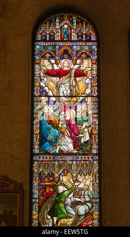 Detail Of A Stained Glass Window Telling The Story Of Adam And Eve In ...
