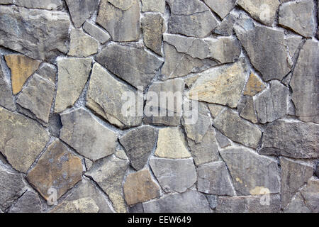 Gray stone walls close up view from the front Stock Photo