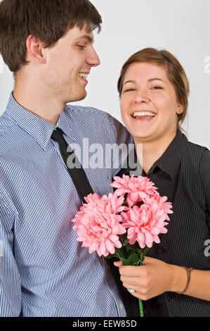 Couple standing together Stock Photo