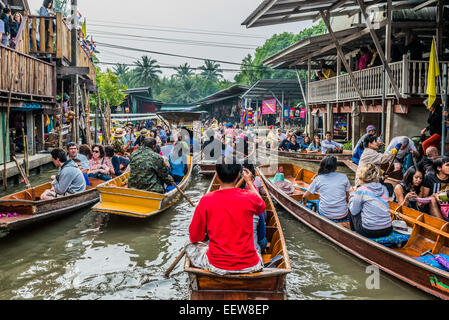 Bangkok, Thailand - December 30, 2013: people on boats at Amphawa Bangkok floating market at Bangkok, Thailand on december 30th, 2013 Stock Photo