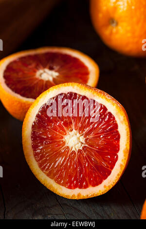 Organic Raw Red Blood Oranges on a Background Stock Photo