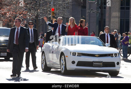 New Texas Gov. Greg Abbott celebrates his inauguration with his wife and daughter as they ride in the inaugural parade in Austin Stock Photo