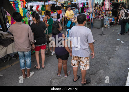 Standing motionless to the Thai national anthem Thailand Stock