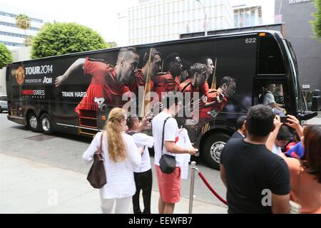 Wayne Rooney signs autographs for fans as he returns to the Manchester United bus after a practice session at the StubHub Center  Featuring: Atmosphere Where: Los Angeles, California, United States When: 19 Jul 2014 Stock Photo