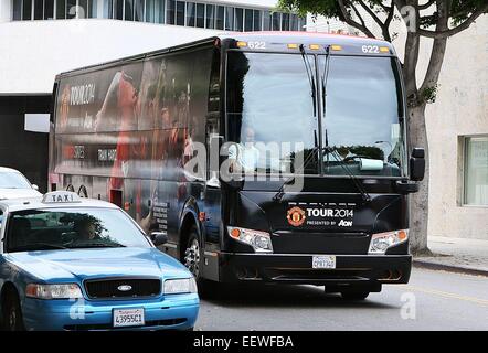 Wayne Rooney signs autographs for fans as he returns to the Manchester United bus after a practice session at the StubHub Center  Featuring: Atmosphere Where: Los Angeles, California, United States When: 19 Jul 2014 Stock Photo