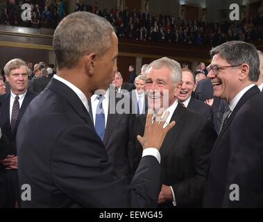 US President Barack Obama greets US Secretary of Defense Chuck Hagel (C) and US Secretary of the Treasury Jacob Lew after Obama delivered the State of The Union address on January 20, 2015, at the US Capitol in Washington, DC. Credit: Mandel Ngan / Pool via CNP - NO WIRE SERVICE - Stock Photo