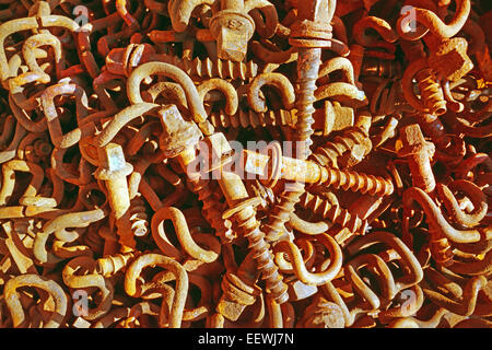 Rusty screws and metal holders Stock Photo