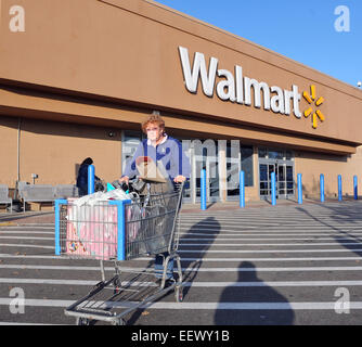 Branford CT USA-Vivian Baker heads out of the Branford Walmart. Walmart opens tomorrow for the holiday shopping season. Baker is from Branford. Stock Photo