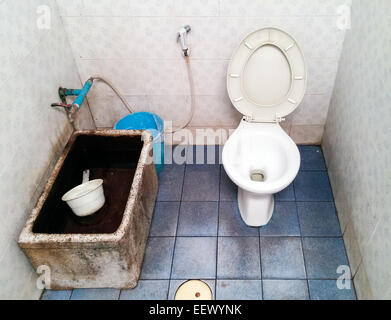 Dirty public toilet of the Thai temple. Stock Photo