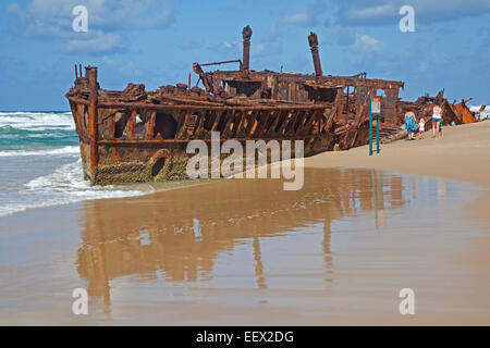 Rusty hulk of the New Zealand hospital ship SS Maheno shipwreck on Fraser Island, Hervey Bay, Queensland, Australia Stock Photo