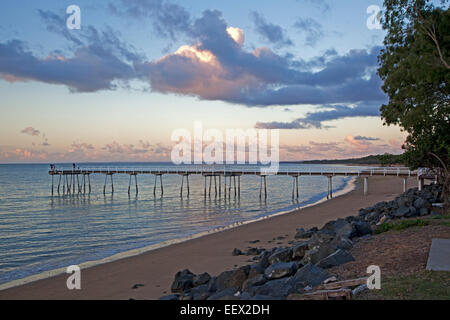 Jetty and sandy beach in Hervey Bay at sunset, Queensland, Australia Stock Photo