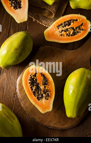 Raw Organic Green Papaya with Black Seeds Stock Photo