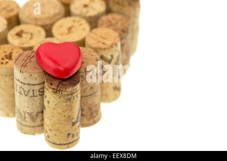 Red heart symbol on wine corks form a heart shape image isolated on white Stock Photo