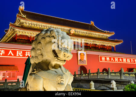 A lion statue guards The Tiananmen Gate at Tiananmen Square. Stock Photo