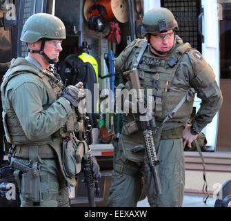 Various SWAT teams stage along High Street during the Yale lockdown Monday Morning. New Haven CT USA Stock Photo