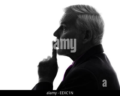 One Caucasian Senior Business Man hushing finger on lips Silhouette White Background Stock Photo