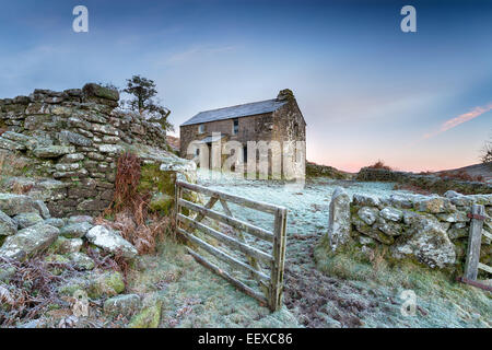 An old abandoned cottage on a frosty winter morning high up on Bodmin Moor in Cornwall Stock Photo