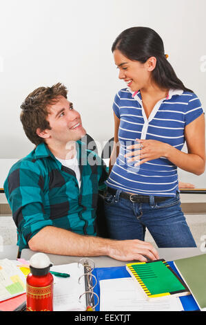 Two students in a classroom Stock Photo
