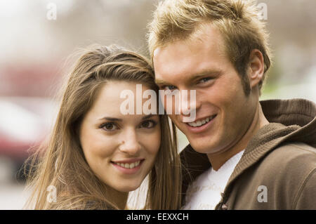 Couple posing together outdoors Stock Photo