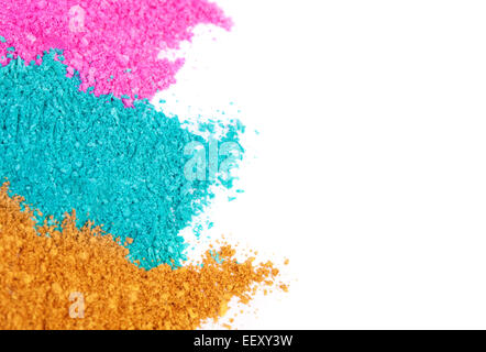Crushed colored eyeshadow on a white background Stock Photo
