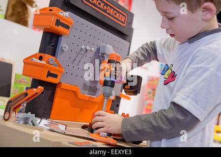 Nuremberg, Germany. 31st Jan, 2023. Nick plays with Flower Market from Smoby  Toys during the Toy Fair novelty show. The toy allows children to create  their own flowers. The 72nd Spielwarenmesse runs