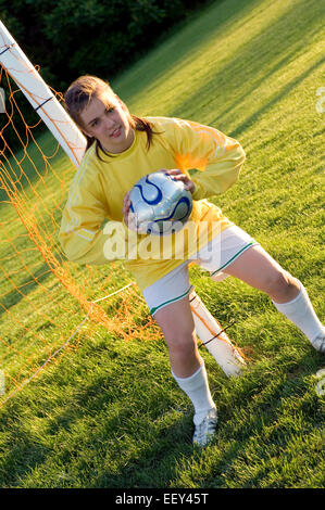 Girl on a soccer field Stock Photo