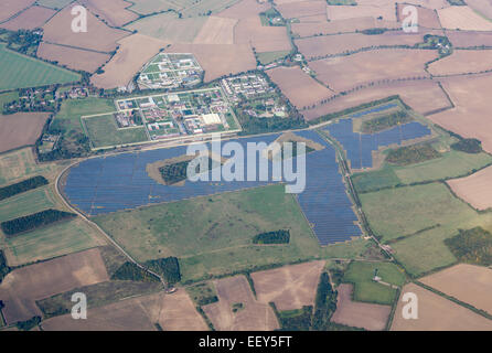 Large solar panels array in fields around Highpoint Prison near Newmarket, England Stock Photo