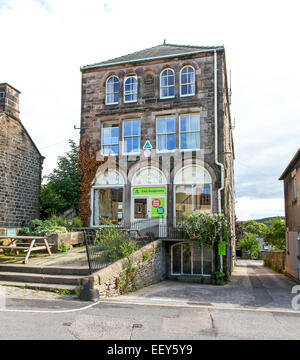 The Youth Hostel building in the old cooperative store or shop at Youlgreave  or Youlgrave Derbyshire England UK Stock Photo