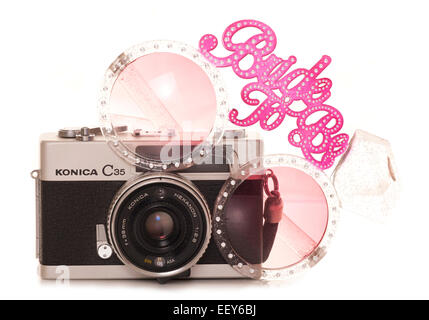 vintage slr film camera with bride to be sunglasses cutout Stock Photo