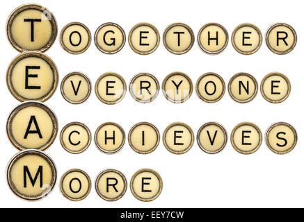 team acronym (together everyone achieves more)  in old round typewriter keys isolated on white Stock Photo
