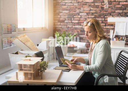 Female interior designer at work Stock Photo